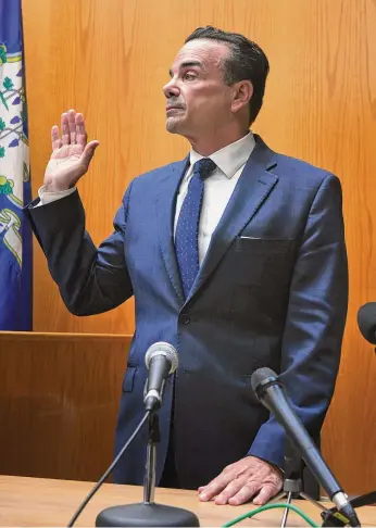  ?? Ned Gerard/Hearst Connecticu­t Media ?? Bridgeport Mayor Joe Ganim is sworn in prior to testifying during a hearing in state Superior Court in Bridgeport on Tuesday.