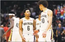  ?? Tyler Kaufman / Associated Press ?? Jalen Adams (6), now with the New Orleans Pelicans, has had 997 points he scored at UConn expunged from the record book, according to the NCAA.
