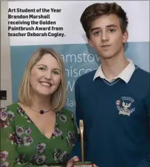  ??  ?? Art Student of the Year Brandon Marshall receiving the Golden Paintbrush Award from teacher Deborah Cogley.