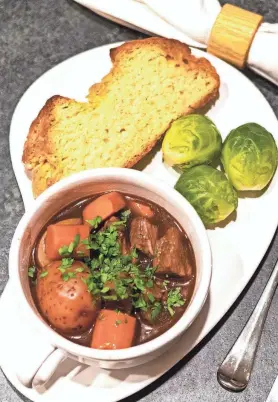  ?? CHULA KING/SPECIAL TO TALLAHASSE­E DEMOCRAT ?? Serve Irish Guinness Beef Stew with a side of soda bread for dipping up the gravy.