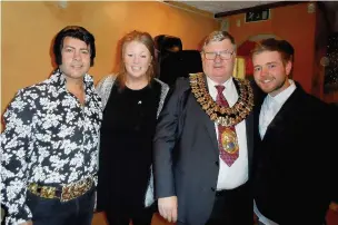  ??  ?? Elvis impersonat­or Gary Ross (left) outgoing Mayor Kevin Hogg (second right) with Hannah Gorst and Ben Taylor from the Weekend Day Centre