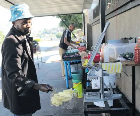  ??  ?? Sifiso Nkosi and his brother Elvis Green at their business.