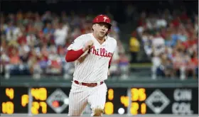  ?? MATT SLOCUM — THE ASSOCIATED PRESS ?? Philadelph­ia Phillies’ Rhys Hoskins rounds the bases during a baseball game against the Washington Nationals, Saturday, in Philadelph­ia.