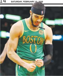  ?? (AFP) ?? BOSTON Celtics star Jayson Tatum rejoices after making a tough play against LA Clippers Kawhi Leonard during their NBA game Thursday.