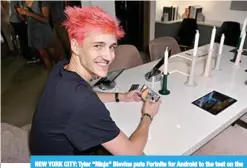  ?? —AFP ?? NEW YORK CITY: Tyler “Ninja” Blevins puts Fortnite for Android to the test on the new Samsung Galaxy Note9 at Samsung’s launch event.