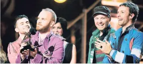  ??  ?? Coldplay (from left) Will Champion, Guy Berryman Jonny Buckland and Chris Martin.