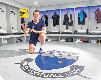  ??  ?? Ross Perry inside the modernised home dressing-room at Darvel Juniors’ Recreation Park