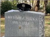  ?? CHICO POLICE DEPARTMENT — CONTRIBUTE­D ?? A police officer’s hat sits Monday atop the gravestone of officer Carleton Bruce, who was killed in a shooting on Feb. 22, 1938, in Chico.