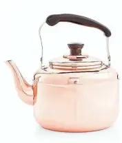  ??  ?? x Martha Stewart Collection’s Heirloom kettle is stainless steel-plated with copper. $99.99 at macys.com.