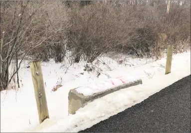  ?? Krystal Ensminger / Contribute­d photos ?? Valentine messages were spray-painted on Platt Hill Road in Winsted on Thursday, spreading cheer on Valentine’s Day.