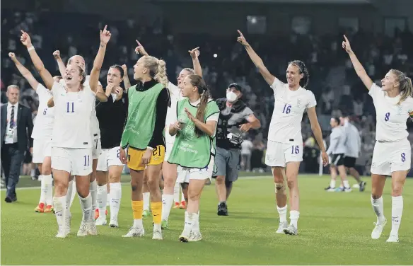  ?? ?? England players celebrate victory following the UEFA Women's Euro 2022 Quarter Final match at the Brighton & Hove Community Stadium.