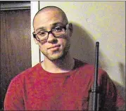  ?? MYSPACE VIA ASSOCIATED PRESS ?? This undated photo from a MySpace page that appeared to belong to Oregon gunman Chris Harper-Mercer shows him holding a rifle.