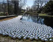  ??  ?? Kusama’s “Narcissus Garden” made up of 1,400 reflective spheres is on display.