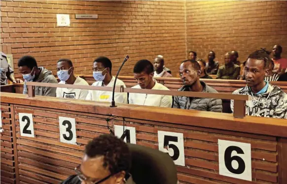  ?? /VELI NHLAPO ?? Six suspects arrested in connection with the murder of Kaizer Chiefs defender Luke Fleurs apply for bail in the Roodepoort magistrate’s court.