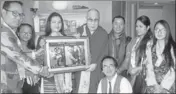  ?? PTI FILE ?? The Dalai Lama with Anshu Jamsenpa (third from left) during the flagoff ceremony of her double ascent in Guwahati.