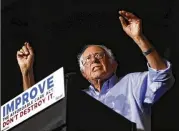  ?? JOHN MINCHILLO / ASSOCIATED PRESS ?? U.S. Sen. Bernie Sanders, I-Vt., seen speaking at a proACA rally in Kentucky in July, said the imminent expiration of a fast-track protocol for repealing the Affordable Care Act is a “major victory.”