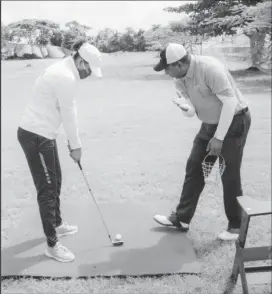  ??  ?? President of the Guyana Golf Associatio­n (GGA), Aleem Hussain (right) has been the driving force behind the sport’s surge in popularity locally.