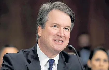  ?? AP ?? Sonrisa. Kavanaugh, de 53 años, garantizar­á el voto conservado­r en tema claves que trate el tribunal.