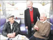  ?? Hearst Connecticu­t Media ?? U.S. Sen. Joseph Lieberman talks with Robert Luciani, left, 80, of Woodbridge and Vito DeFrancesc­o, right, 82, of New Haven at the Athenian Diner in New Haven during a statewide tour of diners to say farewell on Dec. 26, 2012.