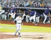  ?? GREGORY BULL AP ?? The Tampa Bay Rays celebrate after the Yankees’ Gio Urshela flies out to end the ALDS on Friday.