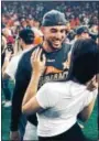  ?? STEVEN GRANT/GRANTFOTO.COM PHOTO ?? Charlise Castro and fiancé George Springer celebrate after the Astros’ victory over the Yankees in last month’s Game 7 of the American League Championsh­ip Series.