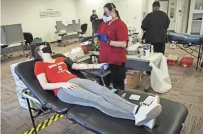  ?? JOSHUA A. BICKEL/COLUMBUS DISPATCH ?? The Red Cross issued an alert on Tuesday, calling blood supplies “dangerousl­y low” and identifyin­g a shortage of volunteers, nurses, technician­s to draw blood and other resources.