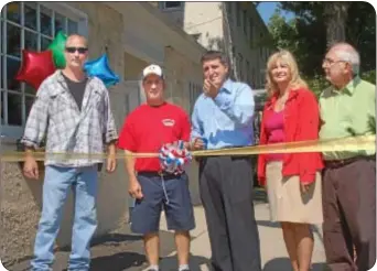  ??  ?? Preparing to cut the ribbon on the new Landolfiís Deli in Langhorne are, from left, building owner Rich Beaumont; Steve Landolfi; State Rep. Frank Farry; and Langhorne Borough Council members Kathy Horwatt and Tony Marfia.