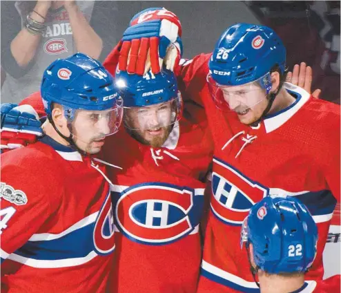  ?? GRAHAM HUGHES LA PRESSE CANADIENNE ?? Les joueurs Tomas Plekanec, Paul Byron et Jeff Petry pendant un match le mois dernier