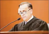  ?? Michelle McLoughlil­n ?? Superior Court Judge Thomas Moukawsher has ordered a disbarred Connecticu­t attorney to turn over documents or be taken into custody.