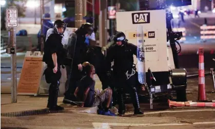  ?? ?? Members of the St Louis police department detain Luther Hall in St Louis, Missouri, on 17 September 2017. Photograph: Lawrence Bryant/ Reuters