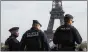  ?? (AP PHOTO/MICHEL EULER, FILE) ?? FILE - Police officers patrol the Trocadero plaza near the Eiffel Tower in Paris, Tuesday, Oct. 17, 2023. France says it has asked 46 countries if they can supply more than 2,000 police officers to help secure the Paris Olympics. Organizers are finalizing security planning for the July 26Aug. 11Games, the French capital’s first in a century.