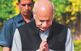  ?? AFP ?? M. J. Akbar at Rajghat, the memorial of Mahatma Gandhi, in New Delhi, earlier this year. At least six women journalist­s have accused the minister of sexual harassment and inappropri­ate behaviour when he had worked as a newspaper editor.