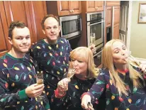  ?? PHOTO COURTESY TAYLOR NORRIS ?? Taylor Norris and her family have been wearing matching pajamas for the past two Christmase­s — and taking selfie-stick photos to prove it.