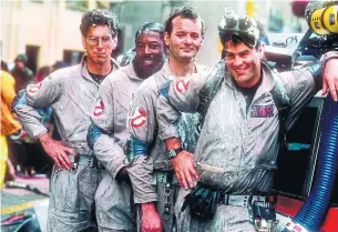  ?? COLUMBIA PICTURES TRIBUNE NEWS SERVICE ?? Harold Ramis, left, Ernie Hudson, Bill Murray and Dan Aykroyd in the 1984 film “Ghostbuste­rs.”