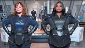  ?? HOPPER STONE/NETFLIX VIA AP ?? Melissa McCarthy, left, and Octavia Spencer in a scene from the comedy “Thunder Force.”