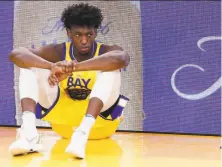  ?? Santiago Mejia / The Chronicle ?? James Wiseman, forced to sit with an injured wrist, averages 12.2 points, 6.1 rebounds and 1.3 blocks in 21 minutes per game.