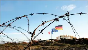  ??  ?? German, French and European flags fly above Fort de Douaumont, at Douaumont, near Verdun, as France prepares to mark the centenial commemorat­ion of the First World War Armistice Day, France, this week. Picture: REUTERS