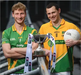  ??  ?? Matthew Cody, the Rathgarogu­e-Cushinstow­n captain, with Clann na nGael’s Philly Garry at the media event before Saturday’s final, held in MW Hire O’Moore Park in Portlaoise.