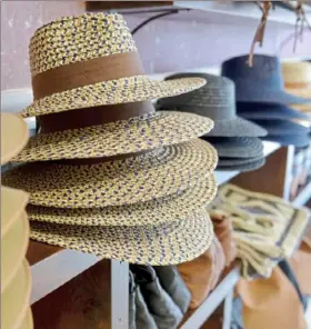  ?? Pam Panchak/Post-Gazette ?? An assortment of hats for sale at Helen &amp; Earl in Dormont.