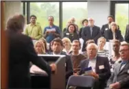  ??  ?? Attendees to the REV-UP Center for Entreprene­urship at Penn State Great Valley listen to James Nemes, chancellor and chief academic officer.