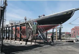  ?? ANDREW VAUGHAN/THE CANADIAN PRESS ?? Bluenose II receives last-minute work in Lunenburg, N.S., before its unsuccessf­ul launch last September. An inability to meet safety standards means the ship is sitting idle instead of visiting cities and hosting tourists.