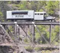  ?? SAM GREEN/THE (CORTEZ) JOURNAL ?? Seen here in August 2013, the Galloping Goose crosses a high trestle bridge across the Animas River.