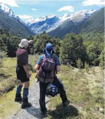  ?? PHOTO: JANE BATCHELOR ?? Within sight . . . Graham Batchelor and friend Caroline Thomson at Shovel Flat beneath Mt Aspiring and the Breakaway on the edge of the Bonar Glacier.