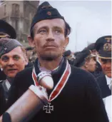  ??  ?? ■ Semmingly ‘elsewhere’, Thurmann was interviewe­d by war correspond­ents shorty after the Knight’s Cross award ceremony. (Colour by RJM)