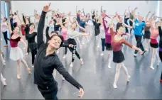  ?? PHOTOS BY GAO ERQIANG / CHINA DAILY ?? From left: Wu Husheng, a principal dancer with Shanghai Ballet, leads a public class; Shanghai Ballet holds free classes for members of the public every two