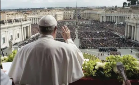  ??  ?? About 80,000 pilgrims listened to his Urbi et Orbi address in St Peter’s Square VATICAN VIA AFP