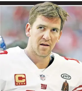  ??  ?? ‘TRICK’ PLAY: Memorabili­a collectors had accused Eli Manning of passing off helmets that were not game-worn as the real deal. Court papers show he blamed equipment manager Joe Skiba (left) if that were the case.