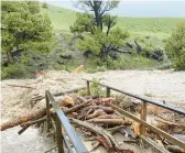  ?? NATIONAL PARK SERVICE ?? A washed-out bridge is shown last Monday from flooding at Rescue Creek in Yellowston­e National Park in Montana. The greatest damage seems to be roads.