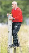  ?? Photograph: Neil Paterson. ?? Johnston Gill, Kinlochshi­el manager, perched high to watch his team stay top of the Premiershi­p.