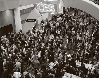  ?? John Locher / Associated Press ?? Last January, crowds filled the convention center on the first day of the CES tech show in Las Vegas. This year, the extravagan­za of tech and glitz kicks off this week with a virtual show.